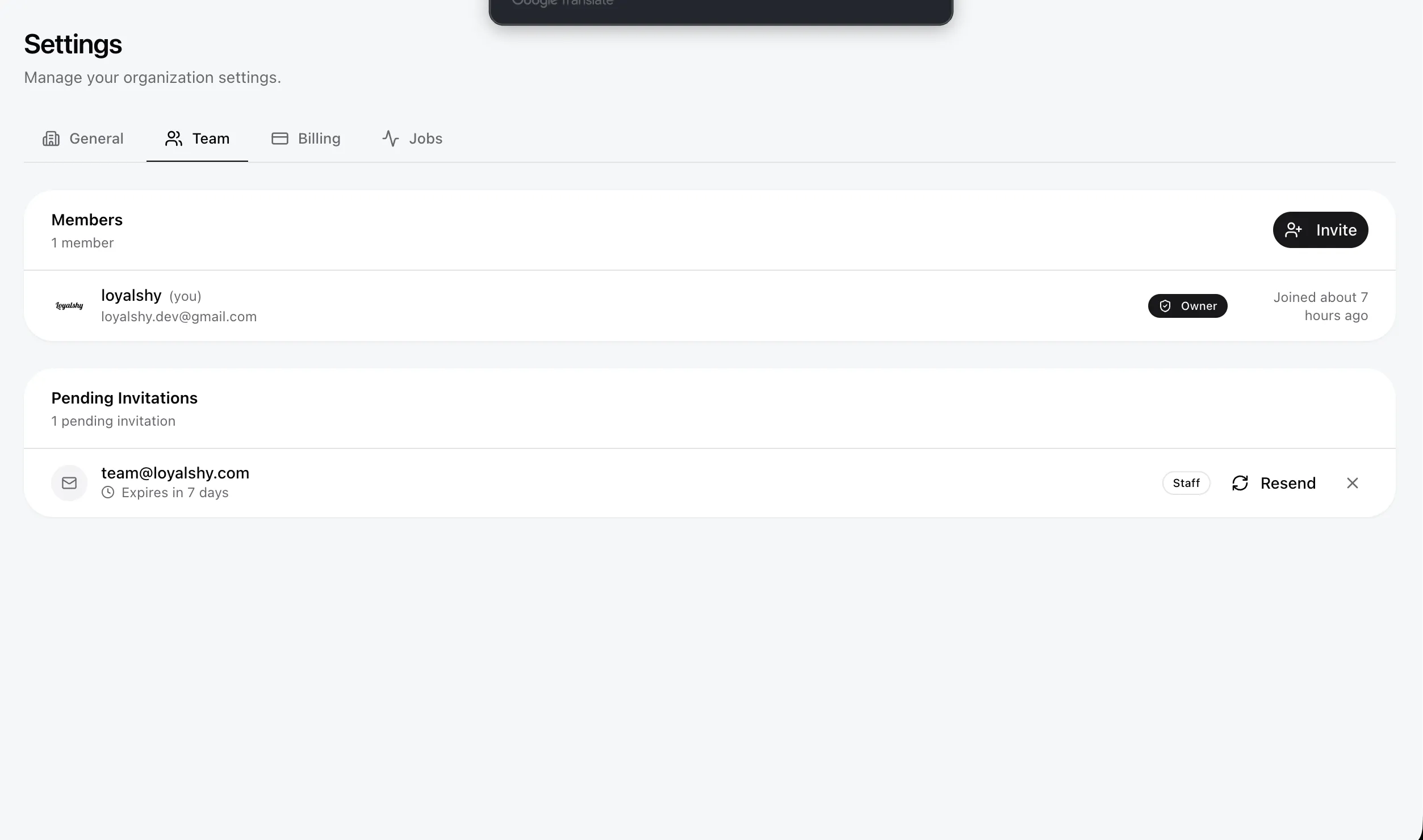 Team settings showing members with roles and invite button